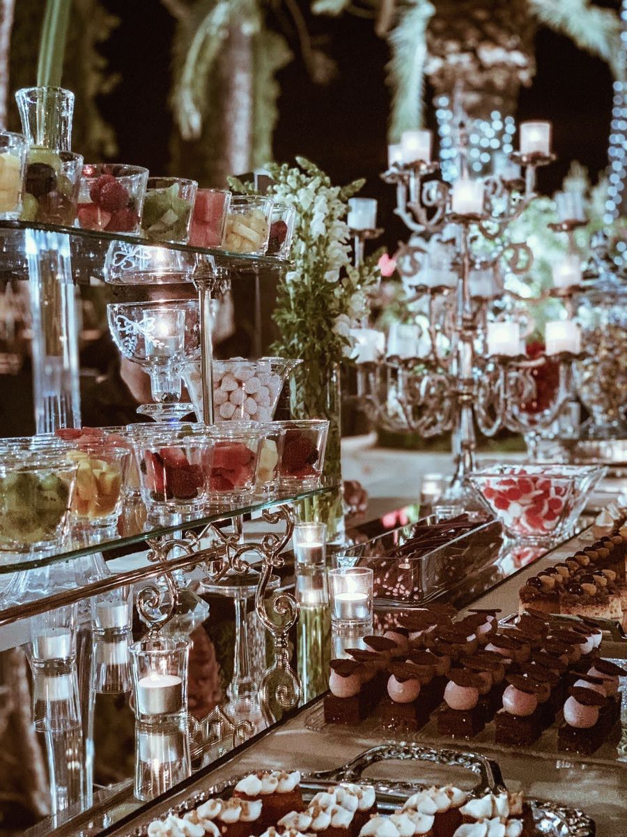 Glass table with candelabras